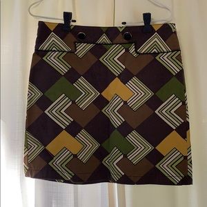 Green, brown, and yellow geometric mini skirt